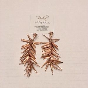 Beautiful Rose gold plated Rivka Friedman dangling earrings. Very fun and chic